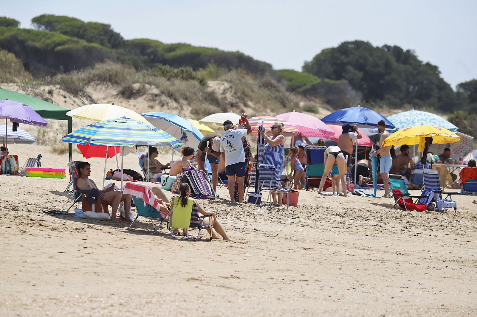 Las imágenes de la jornada de domingo en las playas de Huelva