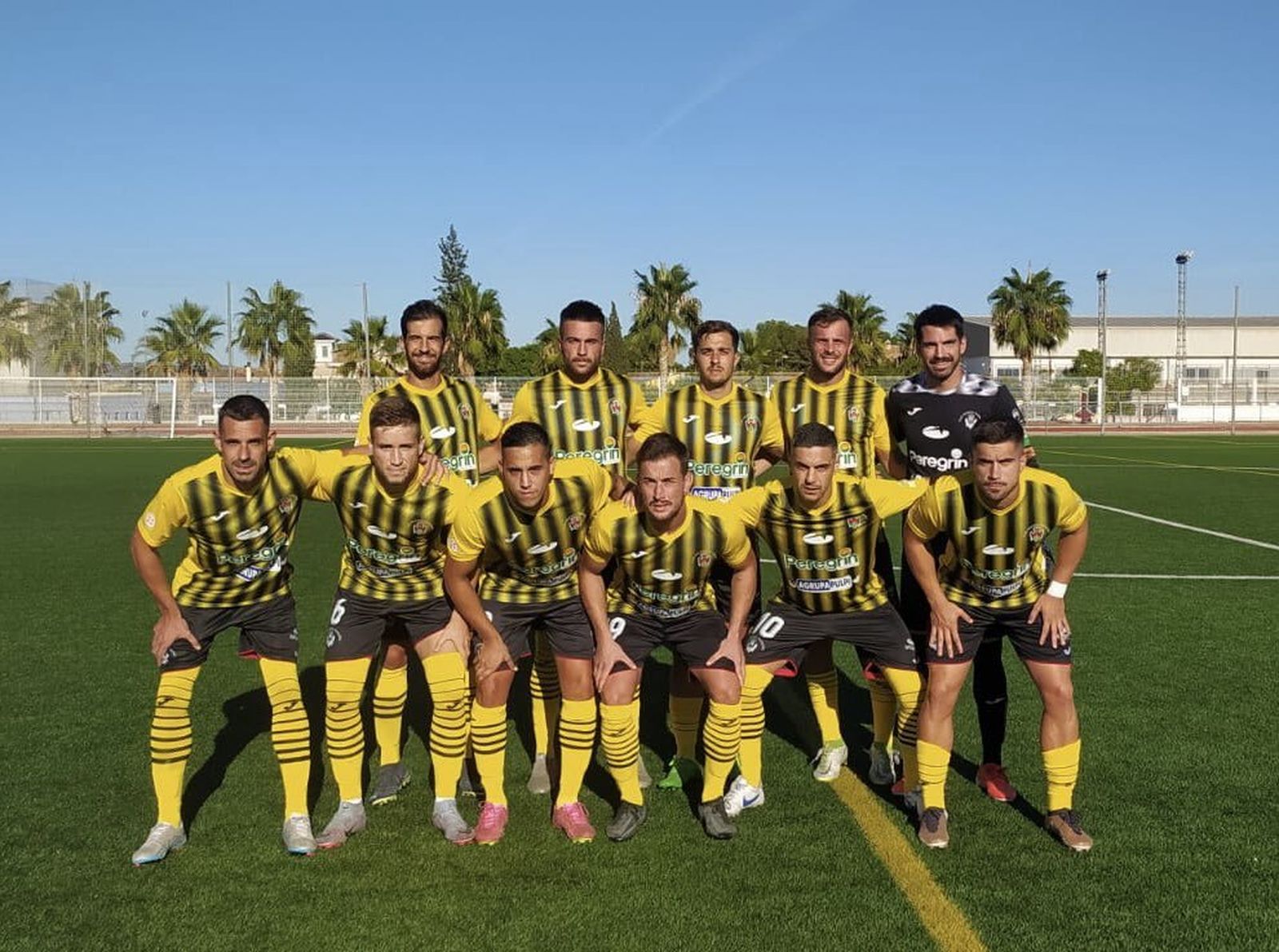 Once del conjunto rojinegro, que vistió con su segunda equipación, en su visita al Racing Murcia.