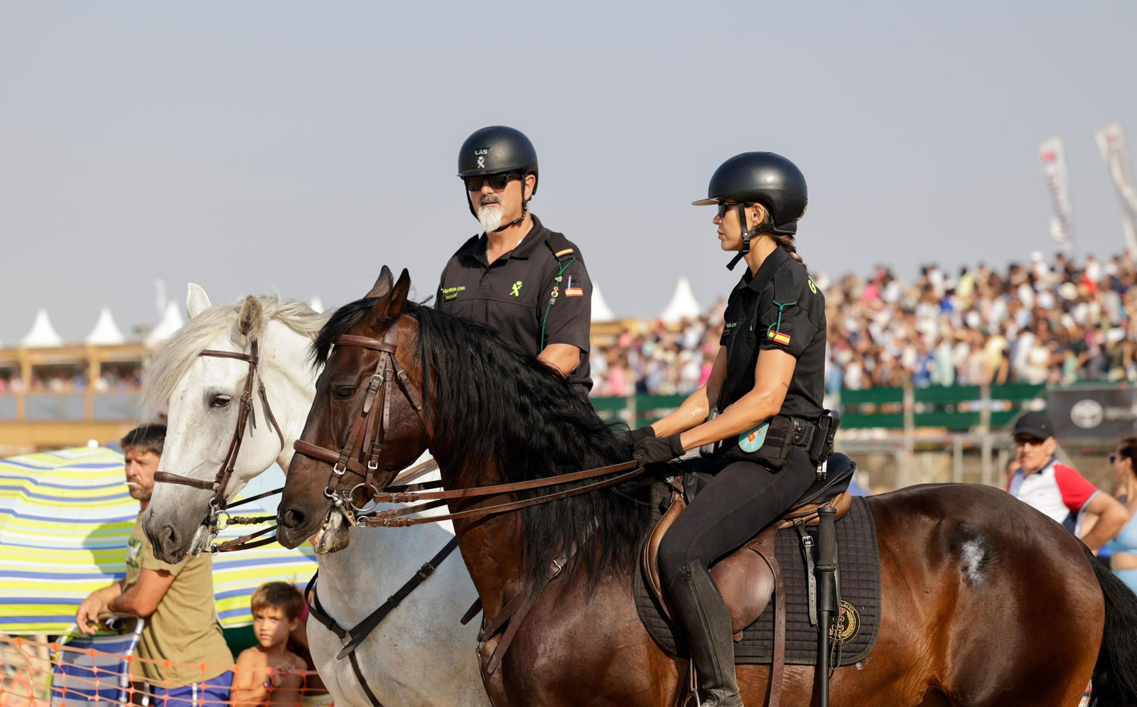 Policías durante las Carreras de Caballos de Sanlúcar 2025