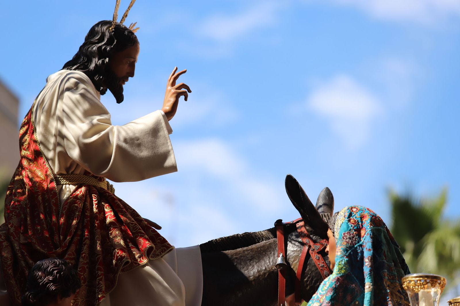La hermandad de la Borriquita en procesión durante el Domingo de Ramos.