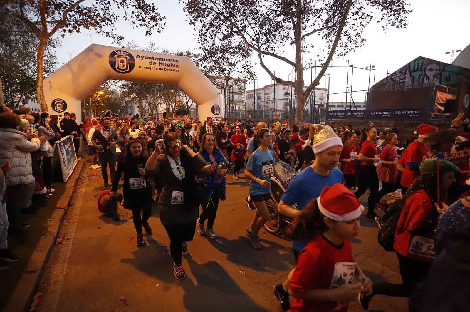 Imágenes de la carrera de San Silvestre en Huelva