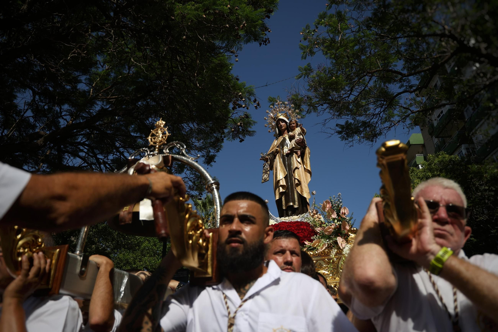 La procesión de la Virgen del Carmen en El Palo, en Málaga, en imágenes