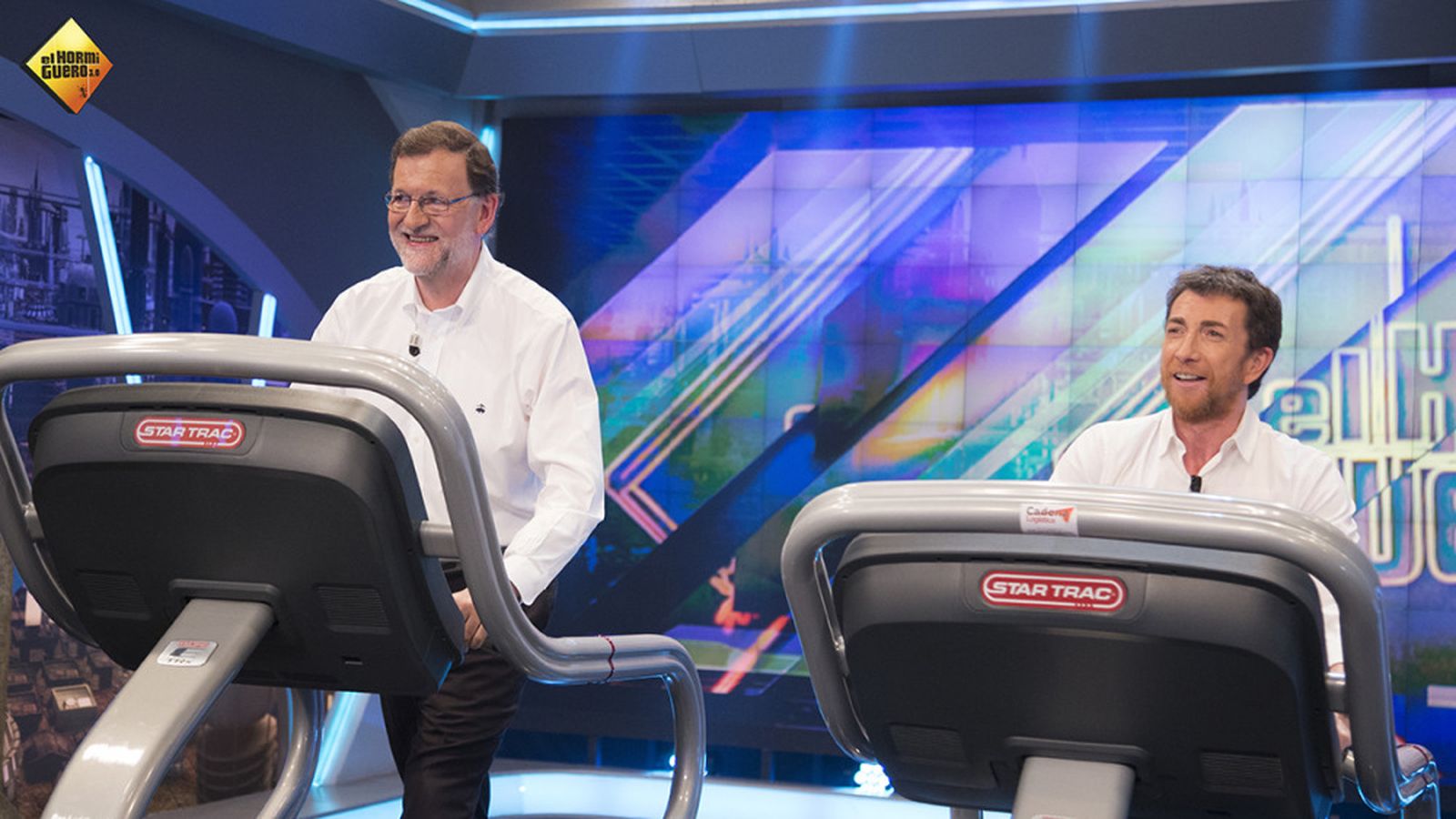 Rajoy y Motos en su duelo de andarines