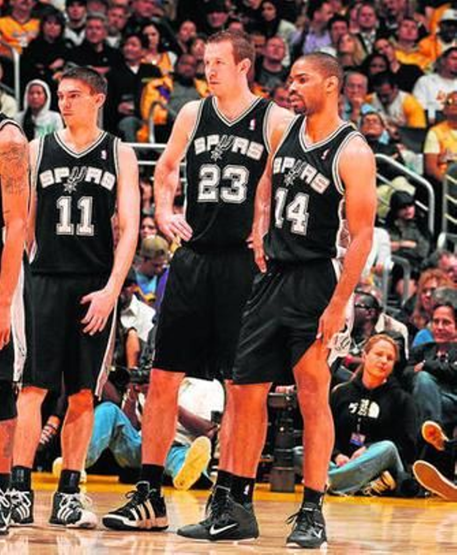 Novak, en el centro, junto al ex cajista Gary Neal.