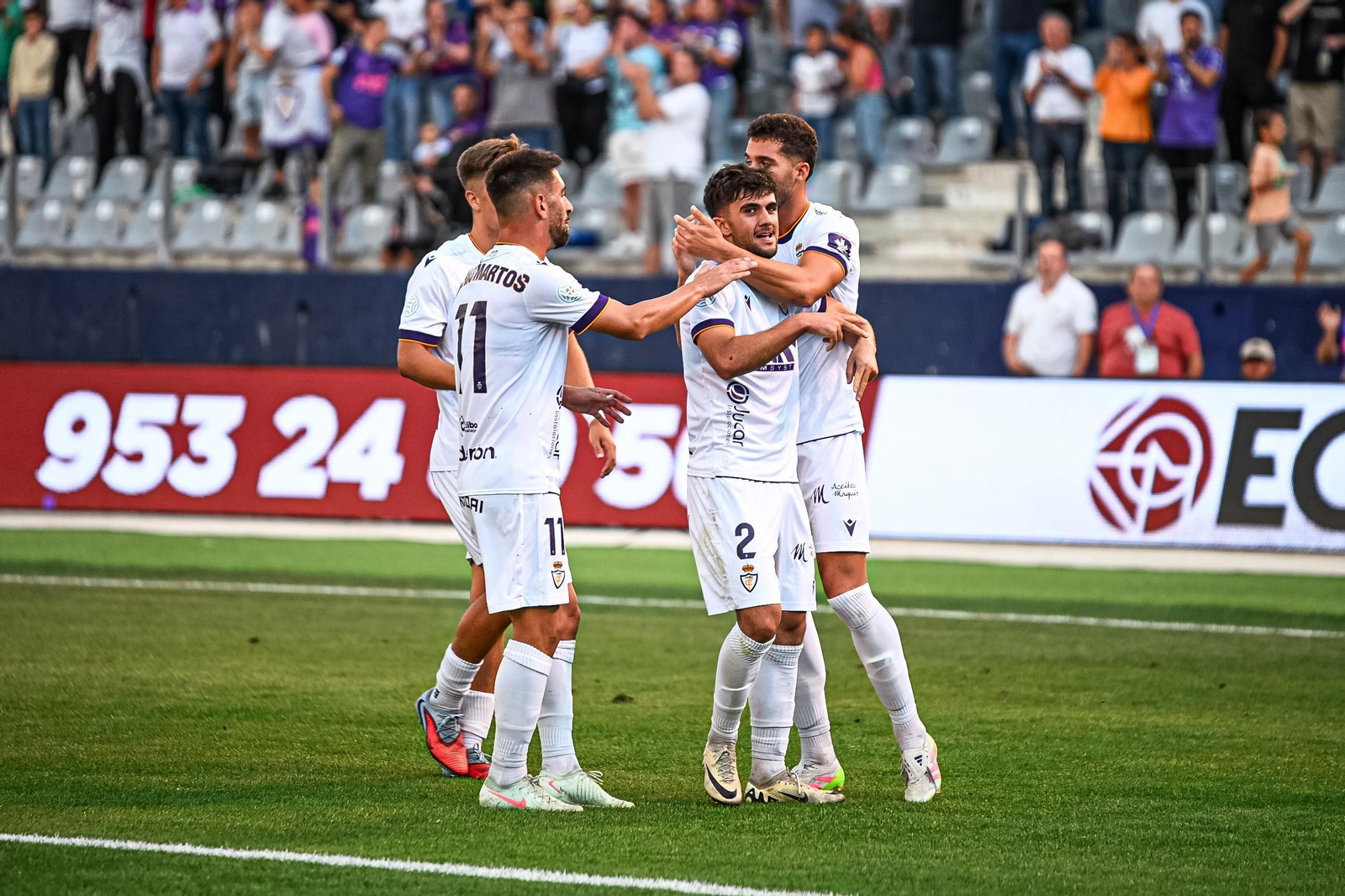 Los jugadores del Real Jaén celebran el tanto de Curro Burgos.
