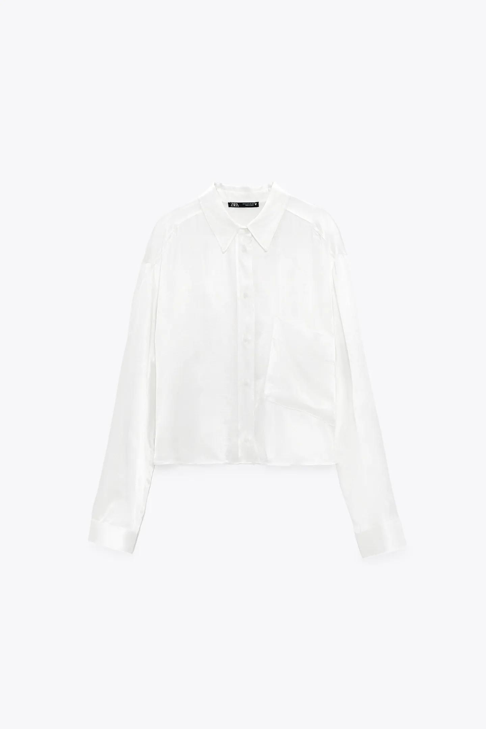 Camisa blanca satinada de Zara. Camisa blanca satinada de Zara.