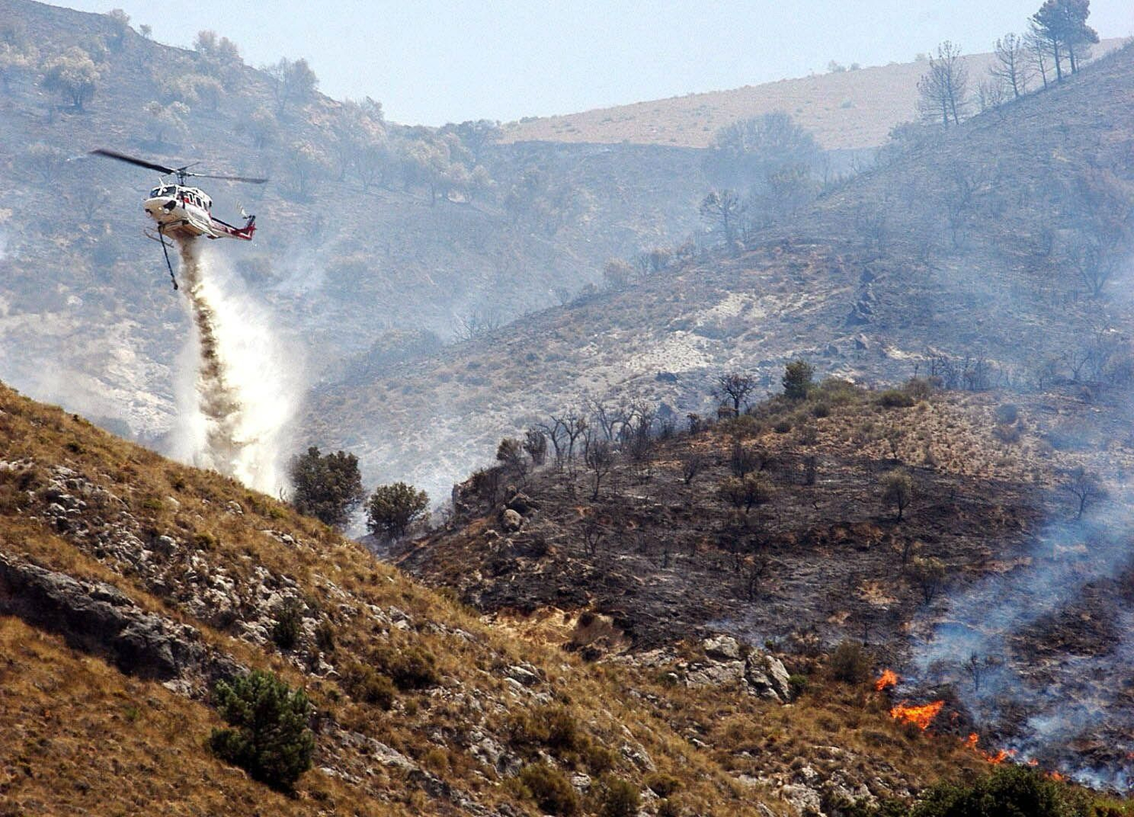 Actuación contra incendios | Imagen de archivo Actuación contra incendios | Imagen de archivo