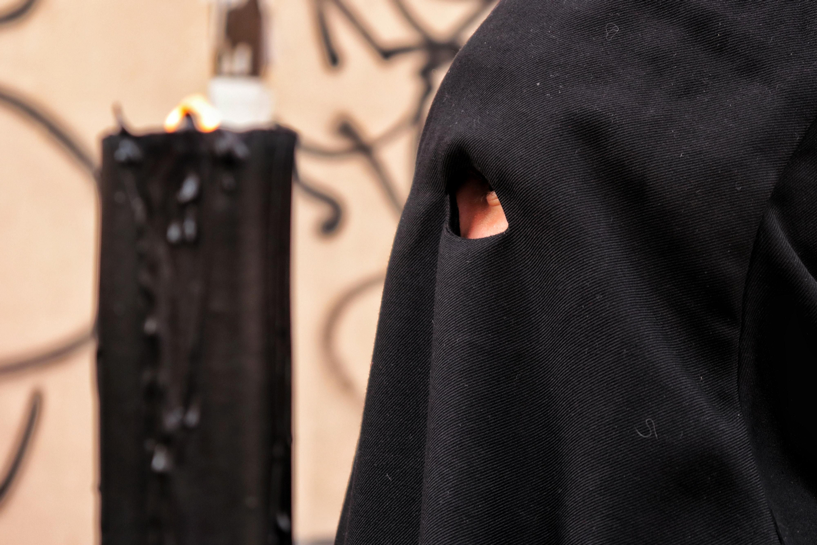 Santa Cruz en el Jueves Santo de Málaga, en imágenes