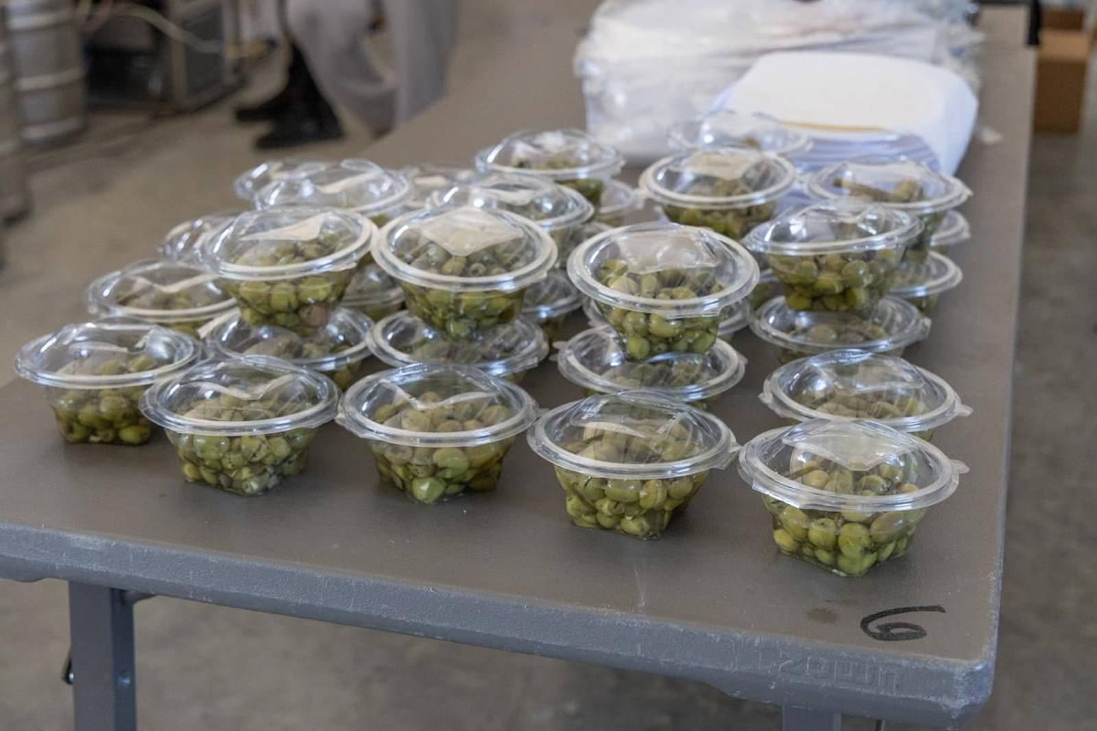 La afición del Real Jaén se vuelca con la paella solidaria por los afectados de la DANA, en imágenes