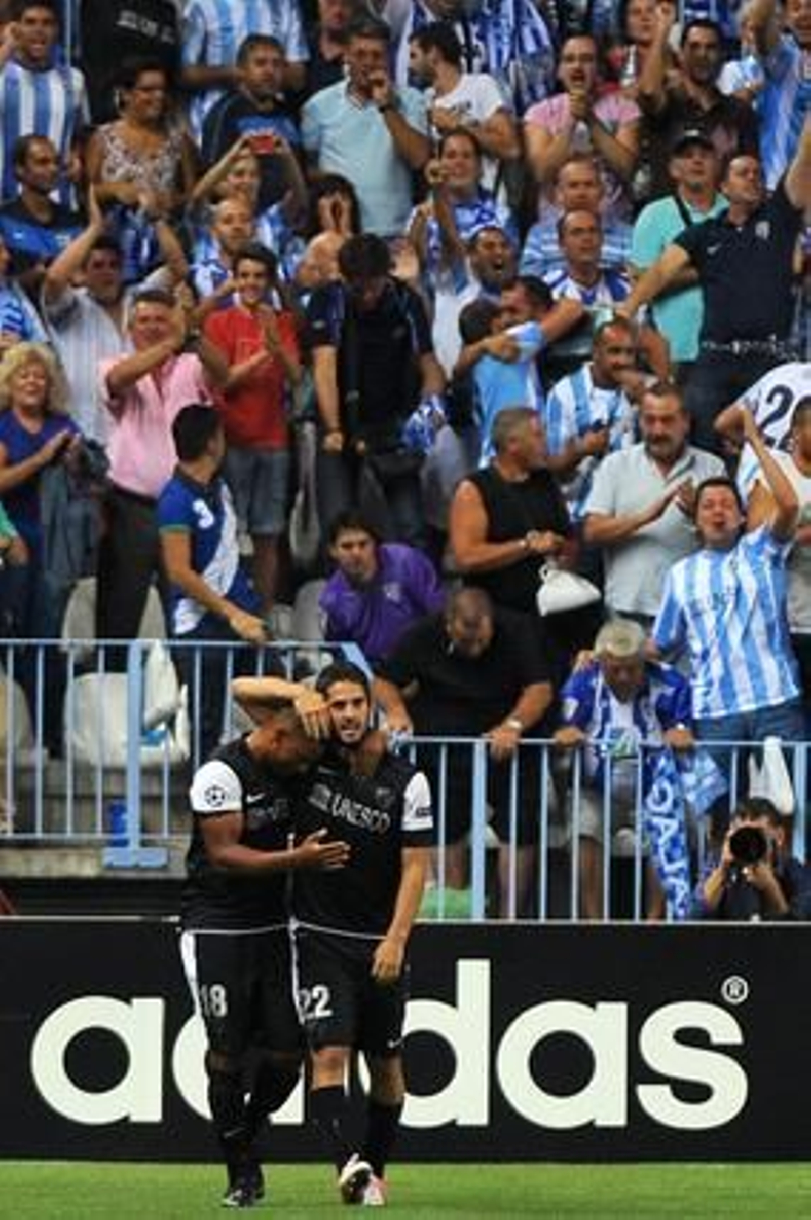 El estreno soñado del Málaga en la Champions, en fotos 

Foto: EFE