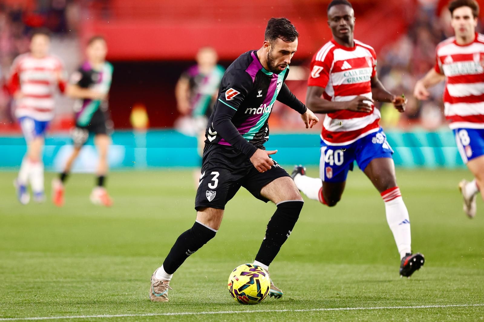 El Granada-Málaga CF, en fotos