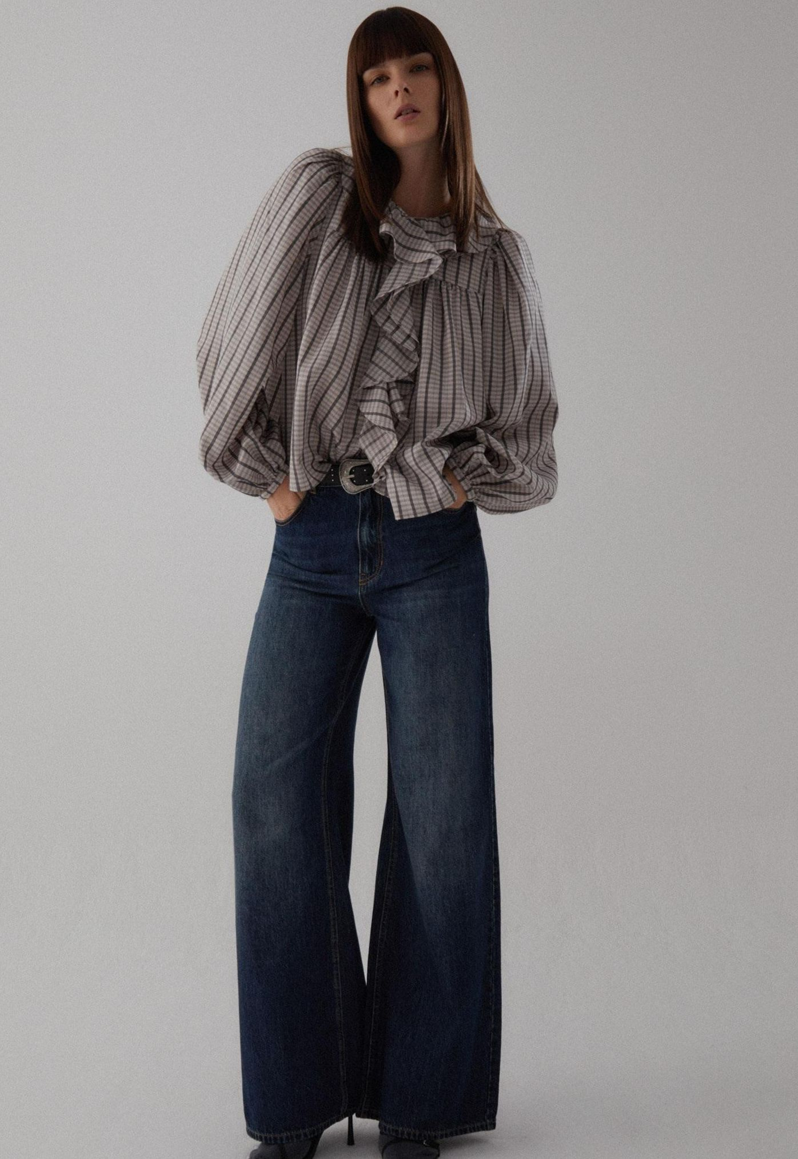 Blusa con cuadros de Sfera.