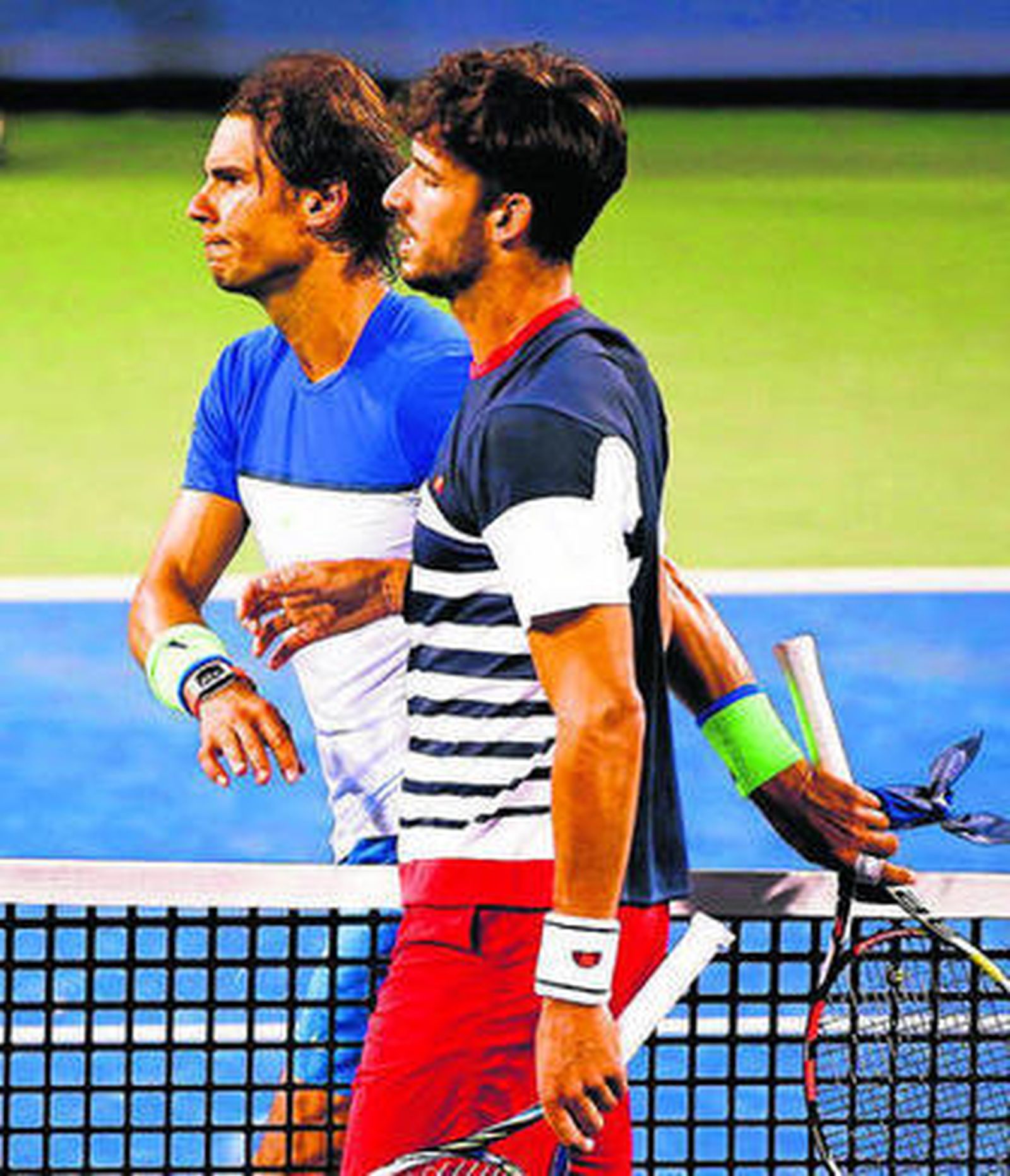 Rafa Nadal se marcha tras saludas a Feliciano López.