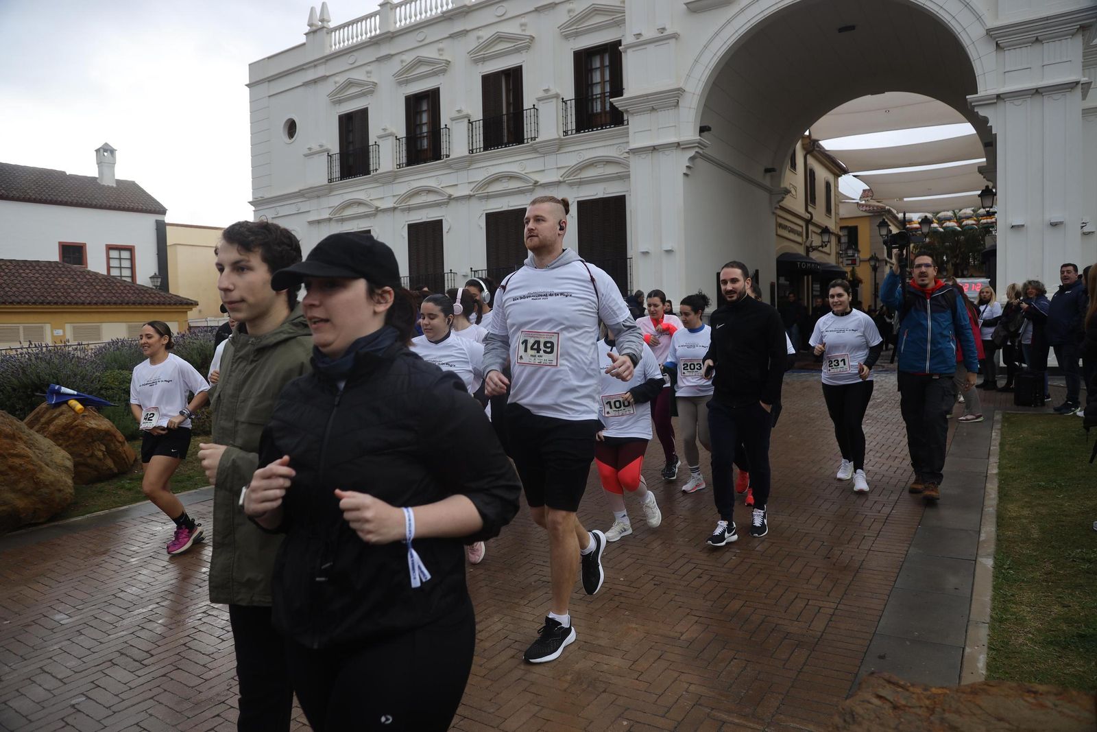 La Carrera por el Día Internacional de la Mujer en Málaga, en fotos