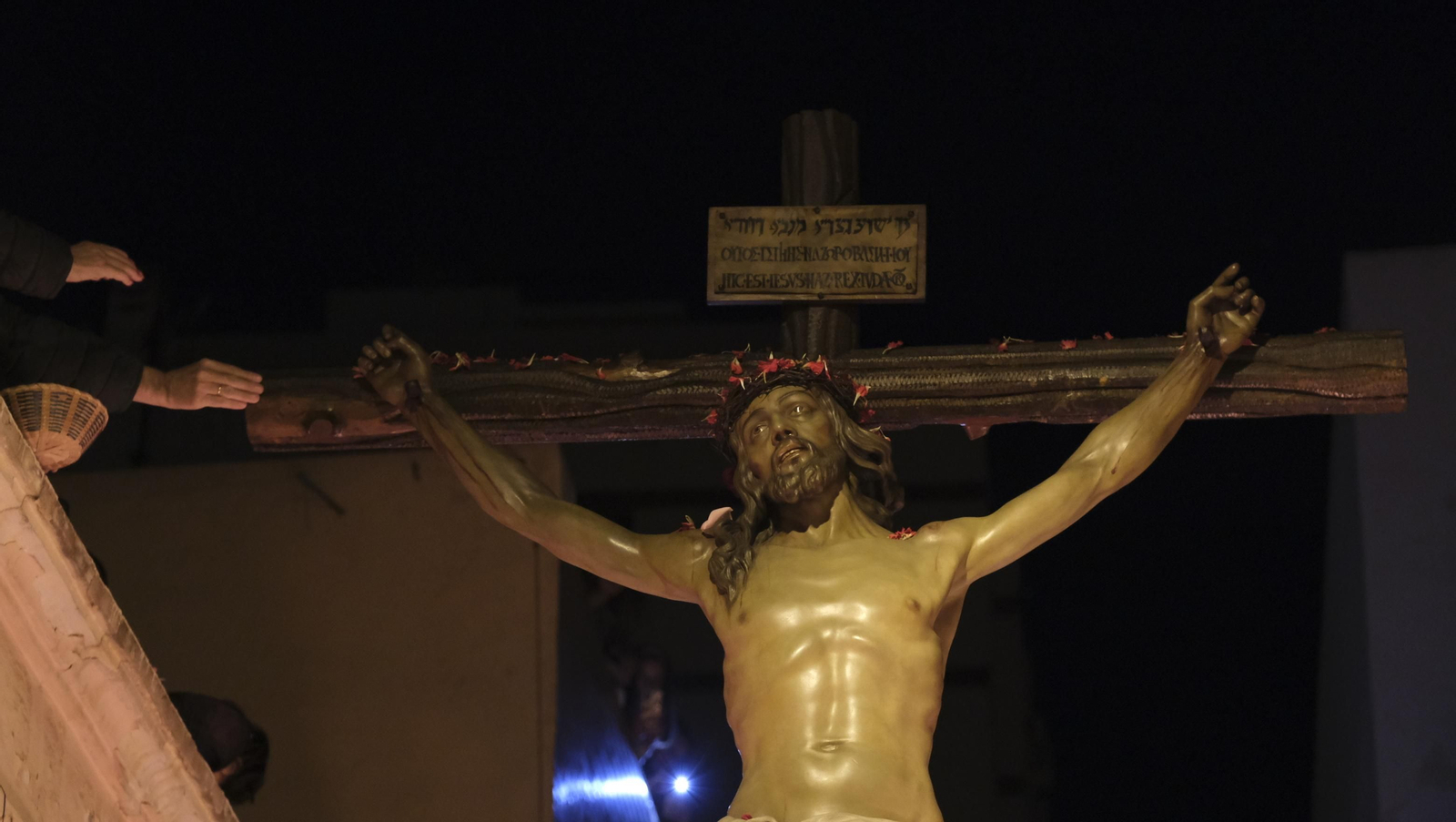 Procesión del Perdón en Almería, en imágenes