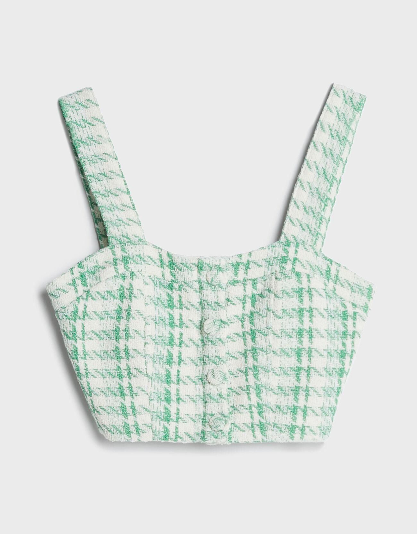 Top cropped de pata de gallo de Bershka.