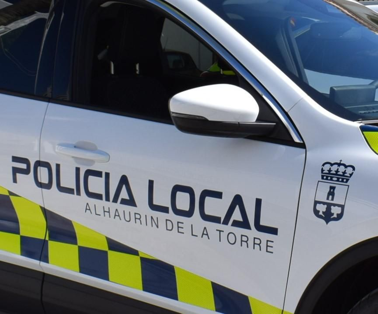 Un coche de la Policía Local de Alhaurín de la Torre. Un coche de la Policía Local de Alhaurín de la Torre.