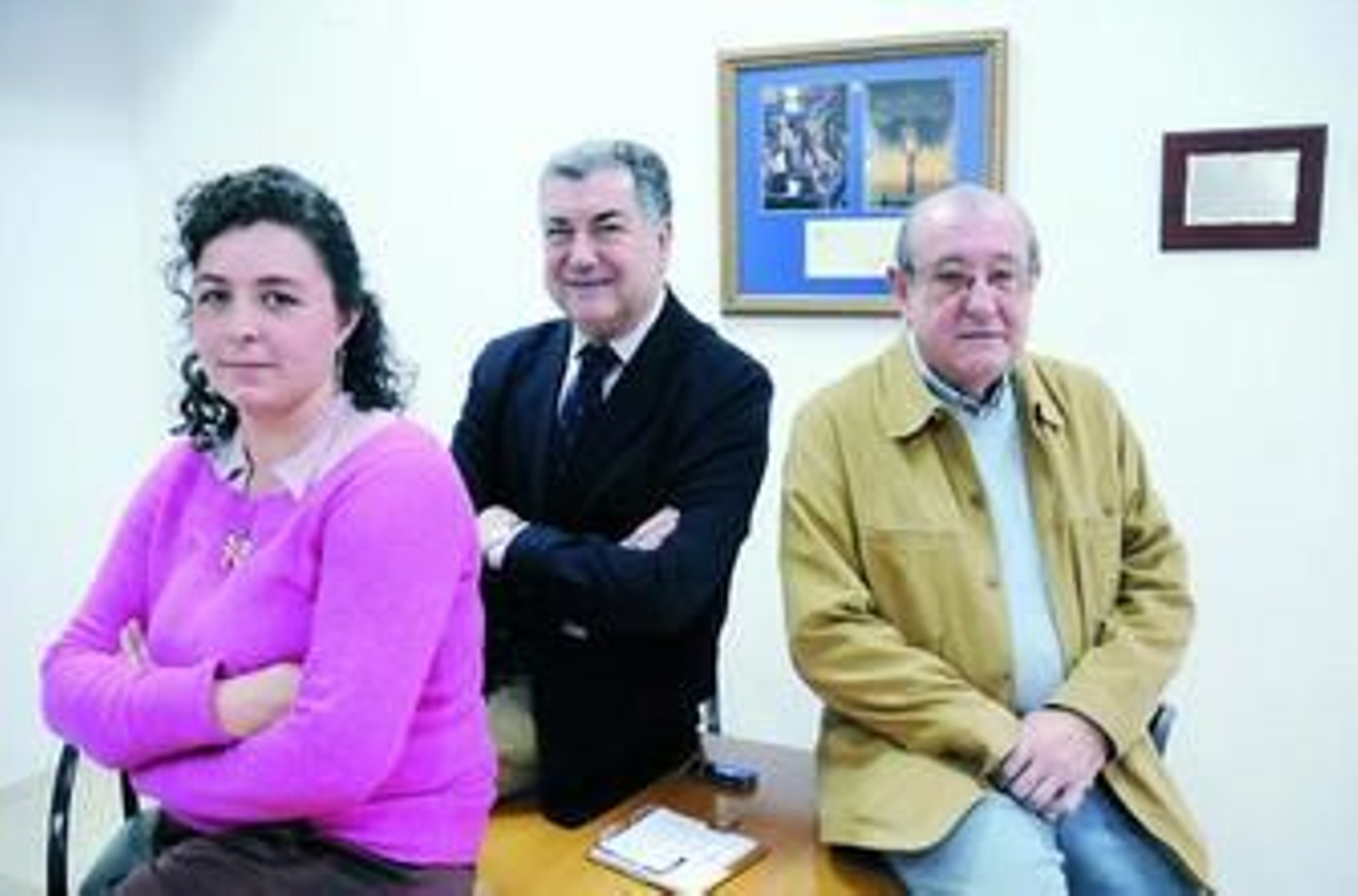 Yolanda López, José Luis Cantalapiedra y Manuel Rodríguez, junto a una imagen de la Carretería.