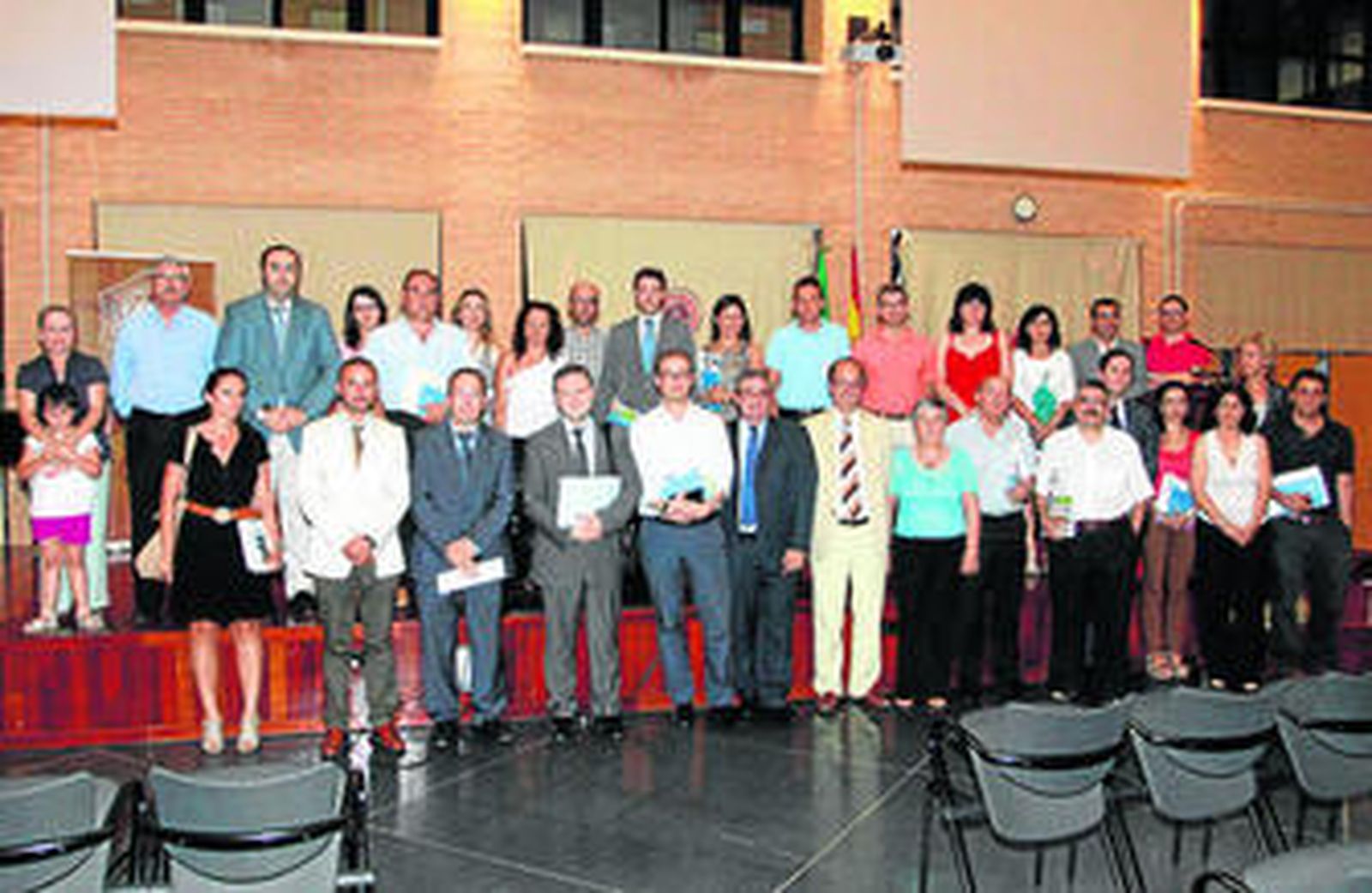 Foto de familia de los profesionales del Derecho Laboral con Miguel Ángel Tortosa, presidente del Colegio, José Luis Monereo, director del Foro.