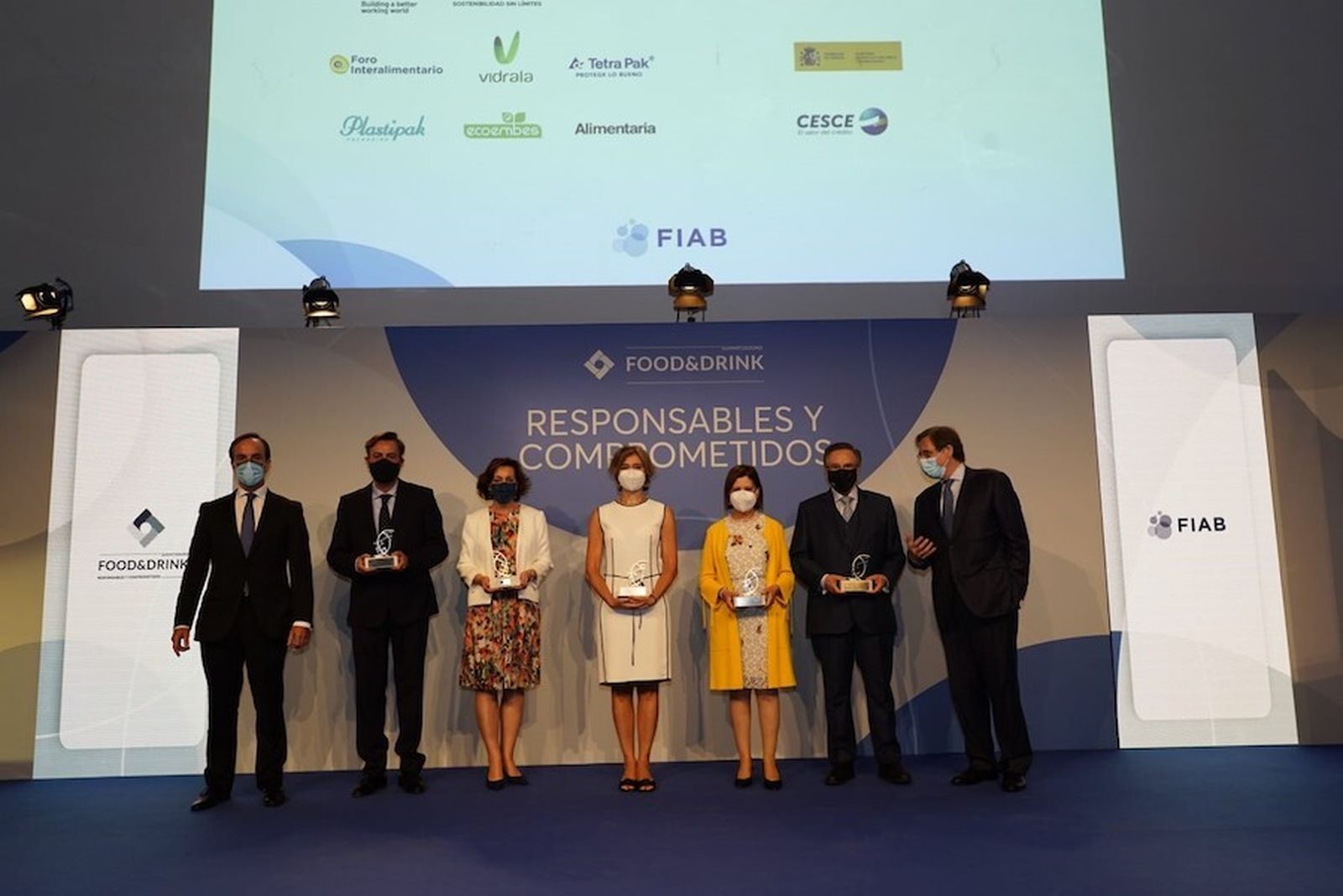 Foto de familia de los premiados
