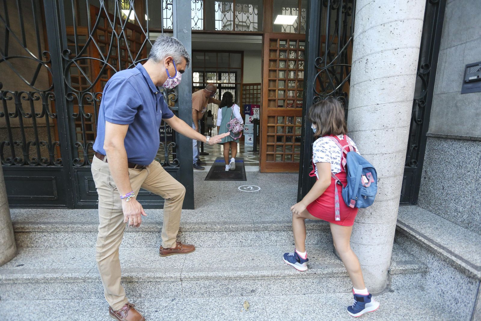 Vuelta al cole en Málaga: Fotos de un día de nervios y mascarillas