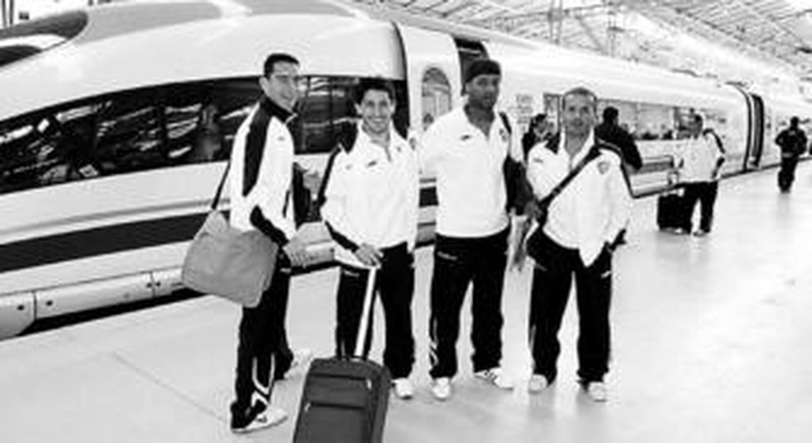 Carpintero, Peragón, Helder y Sandro, antes de tomar el AVE.