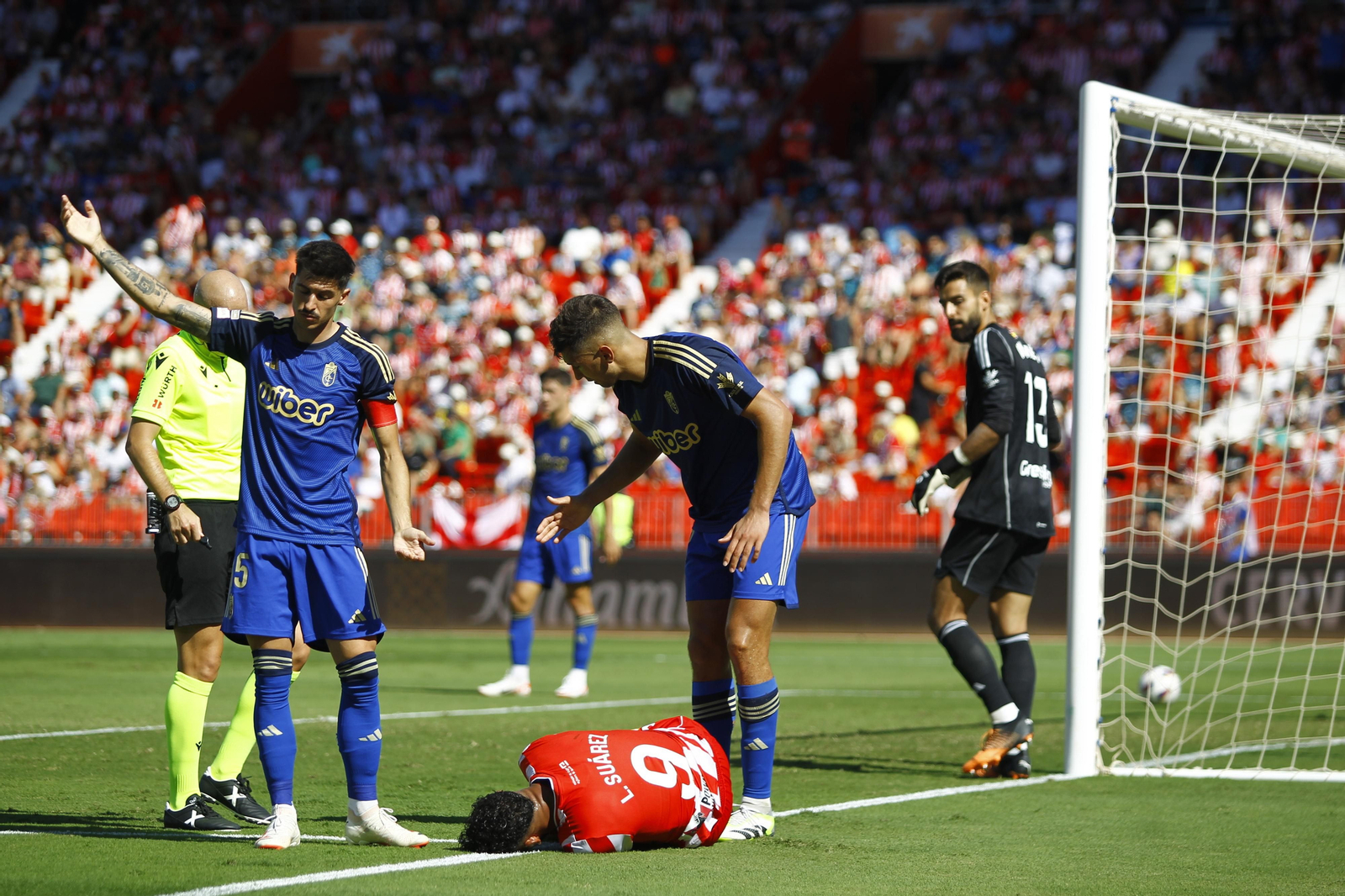 Imágenes del empate a 3 de la U.D. Almería y el Granada C.F.