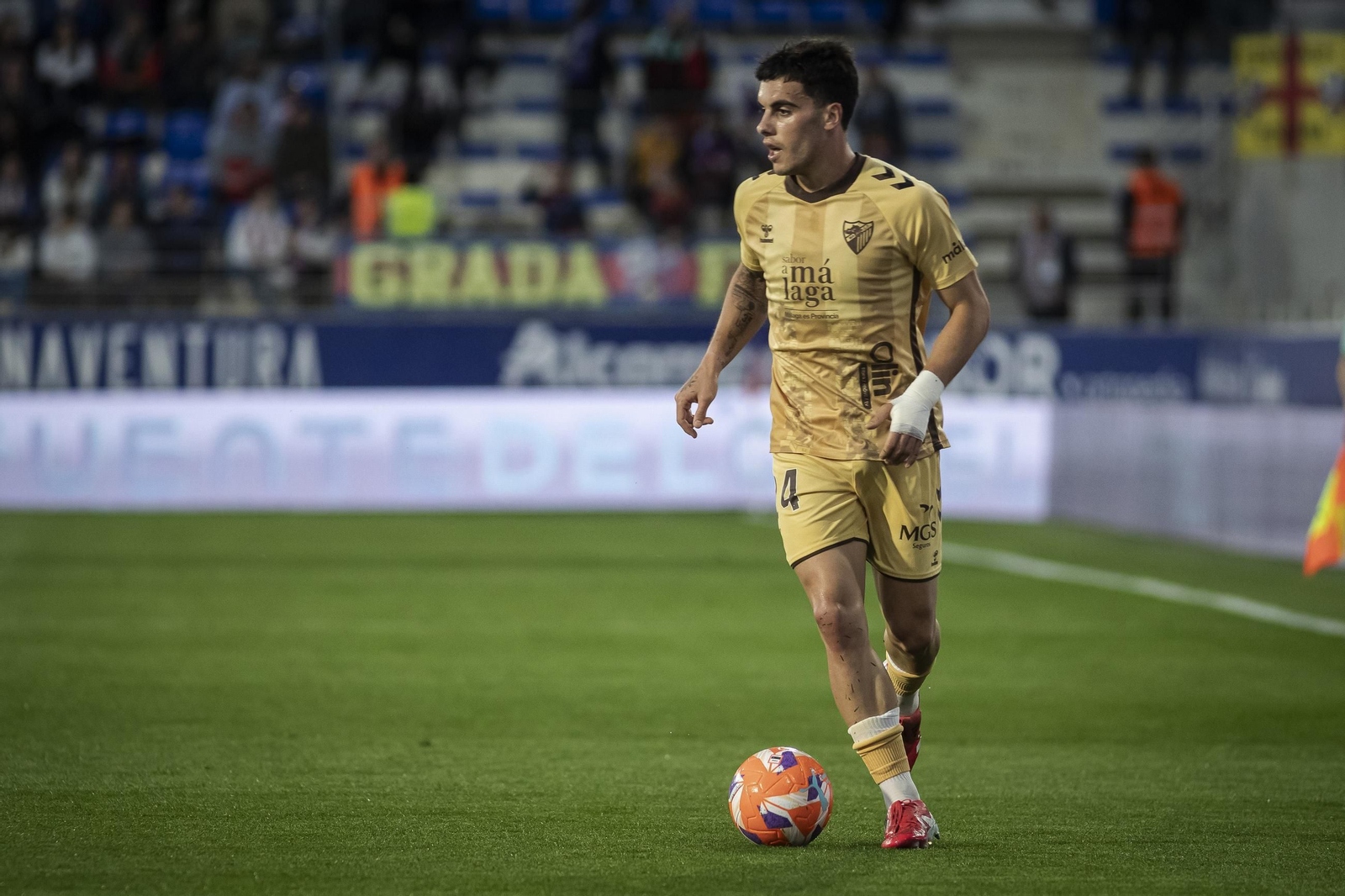 El Huesca-Málaga CF, en fotos