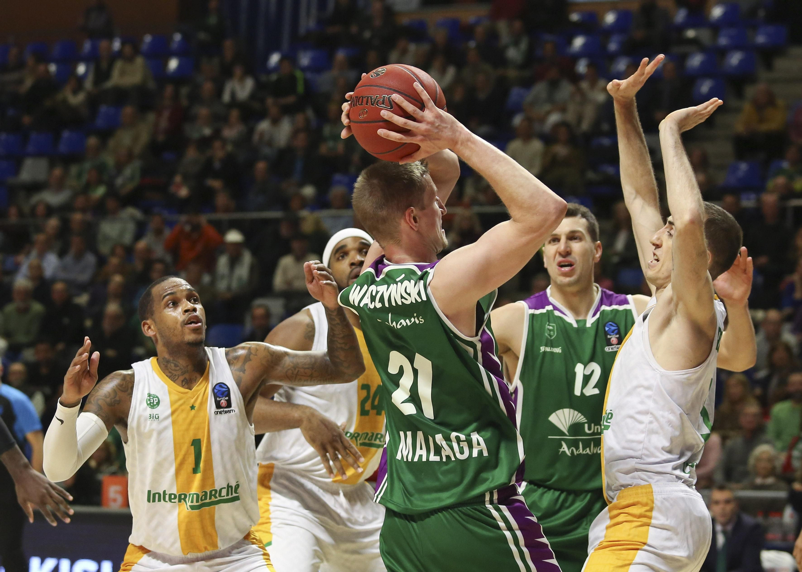 Los cinco años de Adam Waczynski en el Unicaja, en fotos