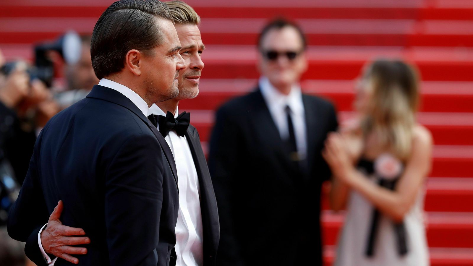 Brad y Leonardo, ante los 'flashes' antes del estreno.