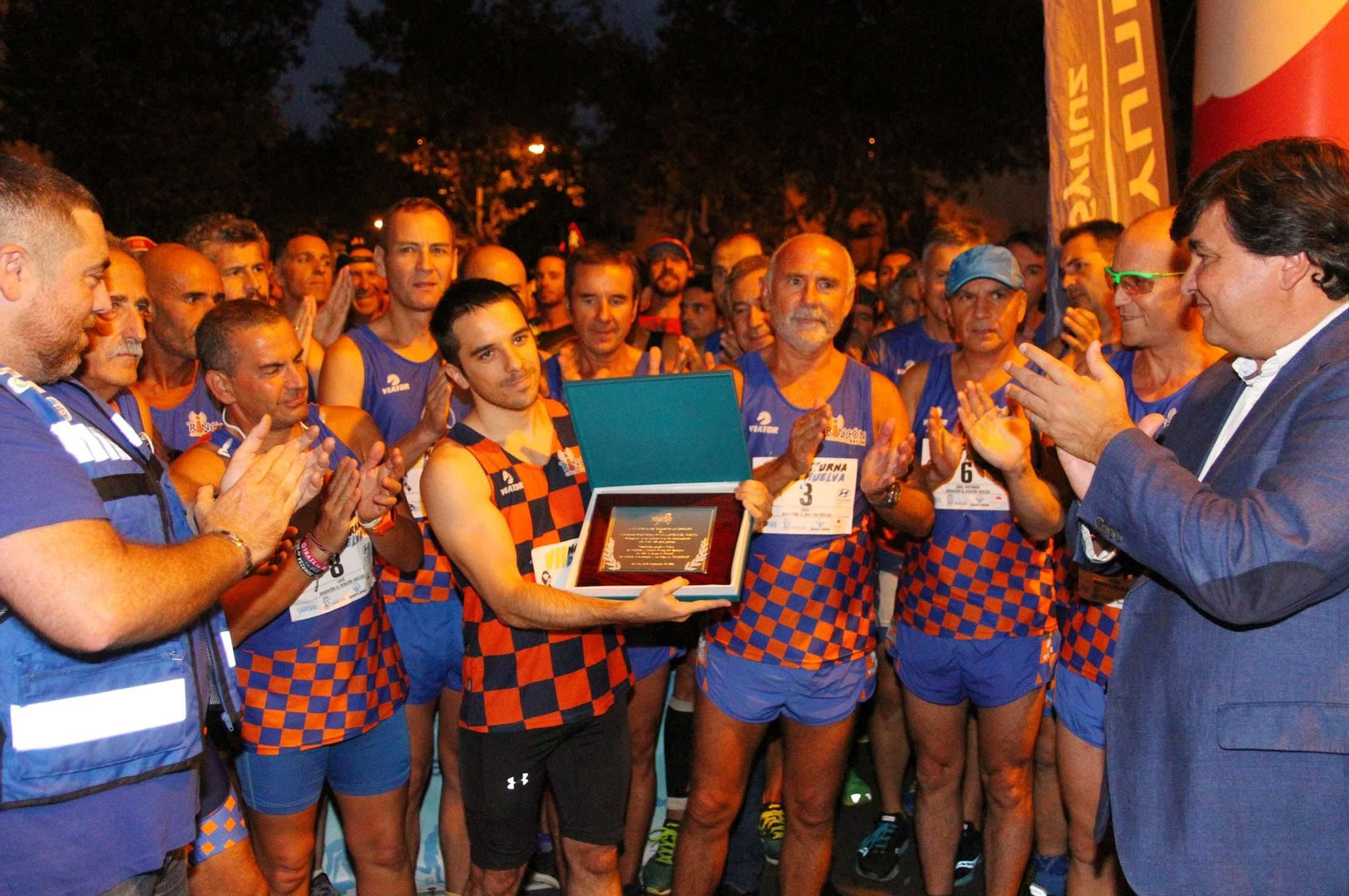 La VII Carrera Nocturna de Huelva en imágenes