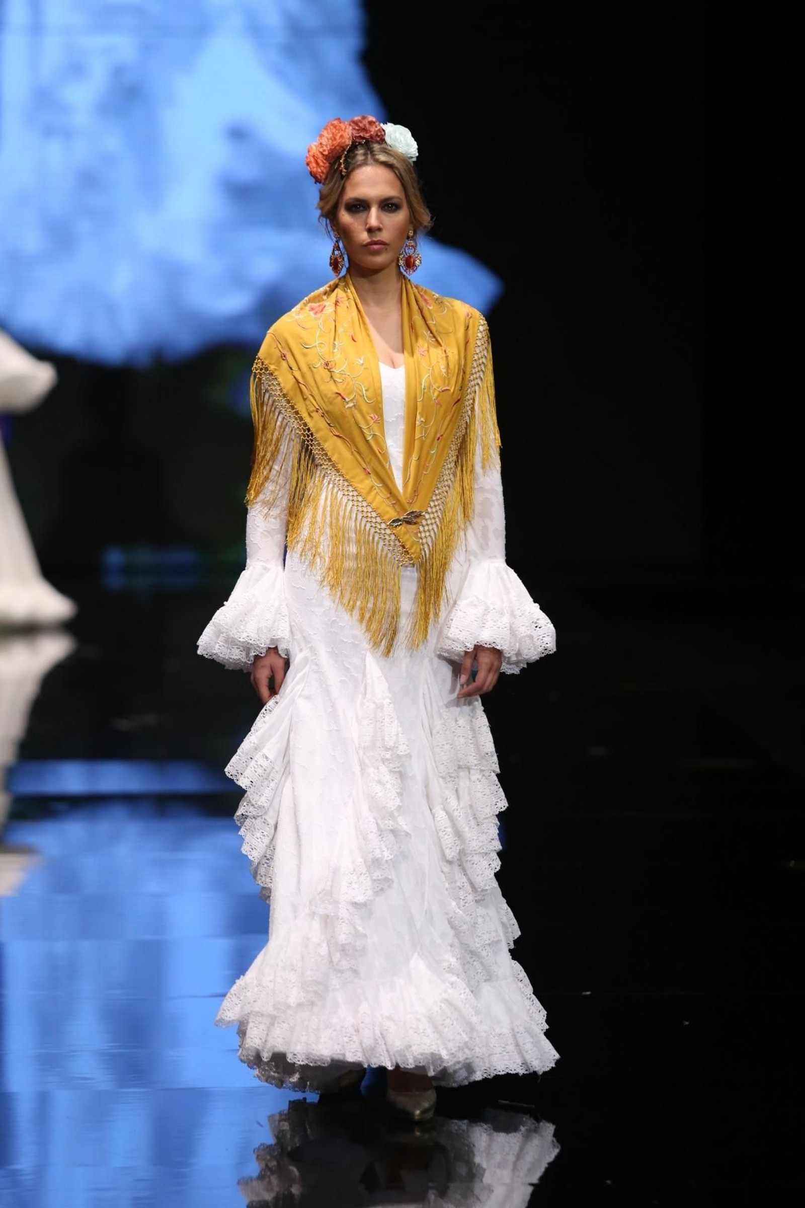 El traje de flamenca blanco y sus versiones más bonitas de esta temporada