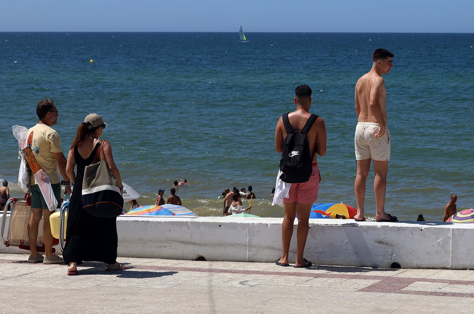 Imágenes de una mañana de calor y playa en Matalascañas