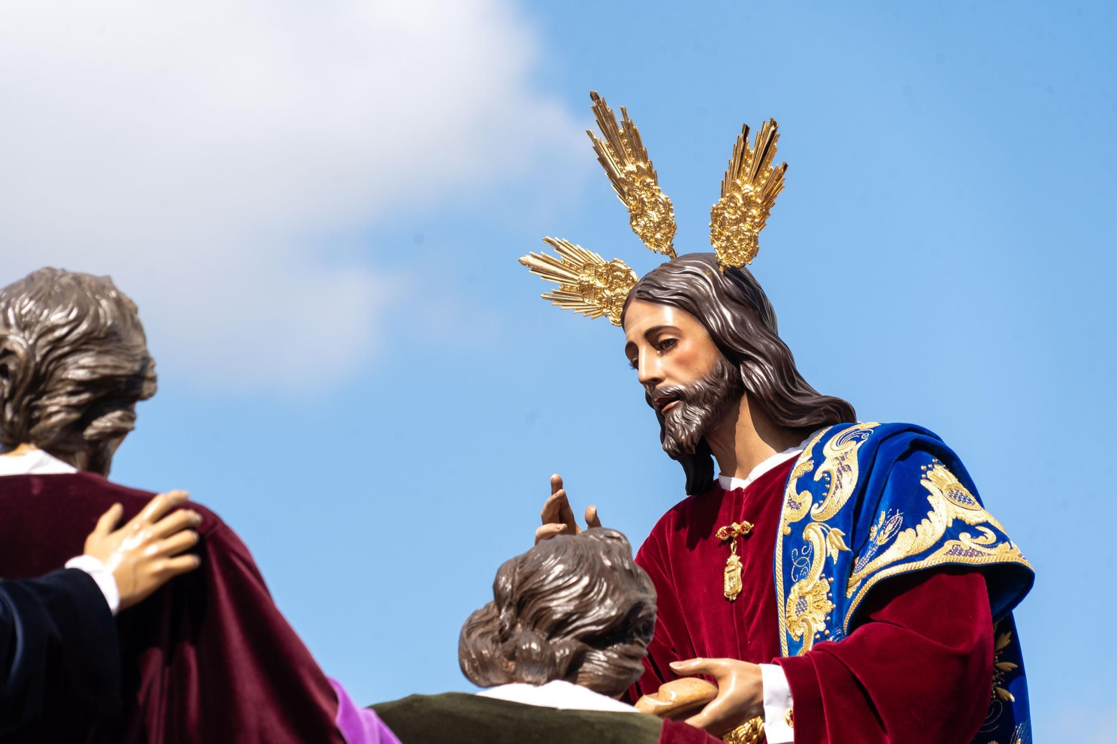 Domingo de Ramos: Imágenes de la procesión de La Sagrada Cena y Maria Santísima del Rosario