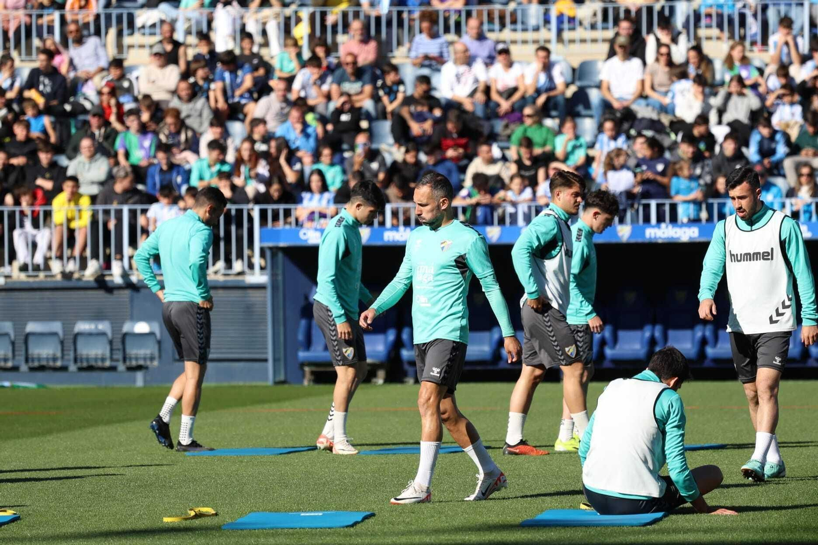 Búscate en las fotos del entrenamiento del Málaga abierto a la afición