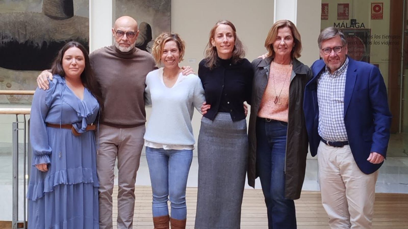 Los ponentes del evento en una foto de familia.