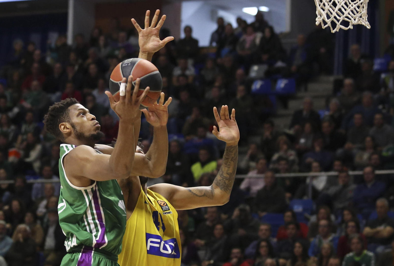 Los cinco años de Adam Waczynski en el Unicaja, en fotos