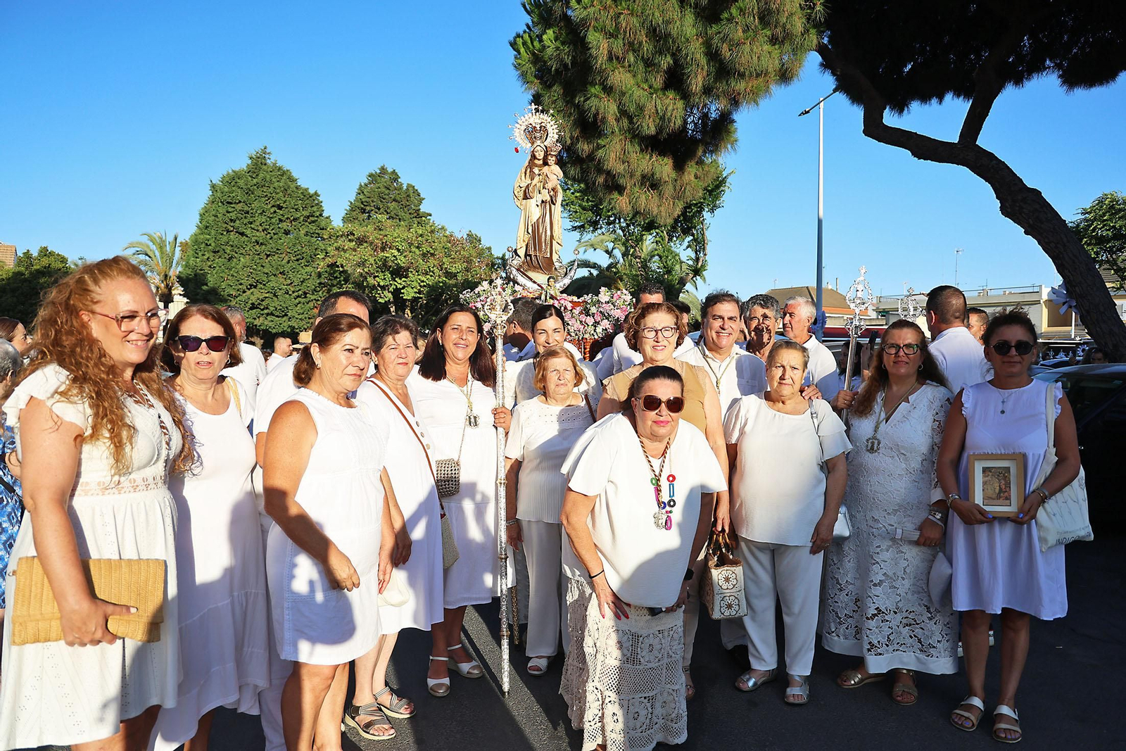 Imágenes de la Virgen del Carmen procesionando en Punta Umbría