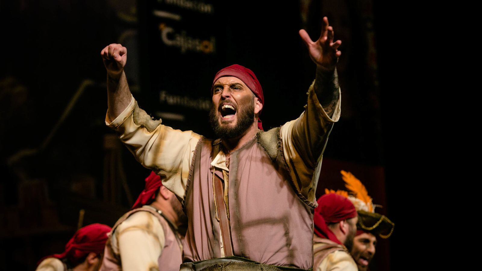 Comparsa 'A base de palos', con tipo de trabajadores de un astillero.