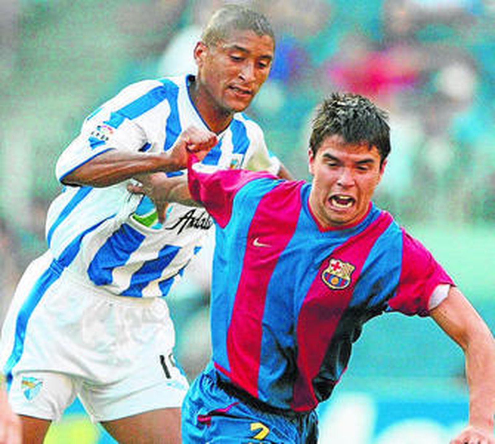 El Gato Romero, ante Saviola durante la 2003/04.