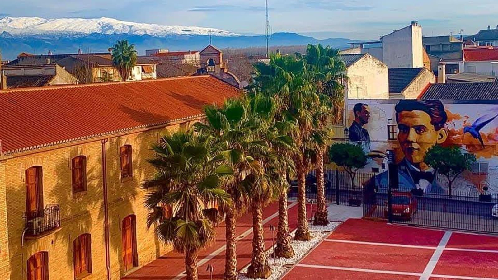 Un mural con la imagen de Federico García Lorca en Fuente Vaqueros
