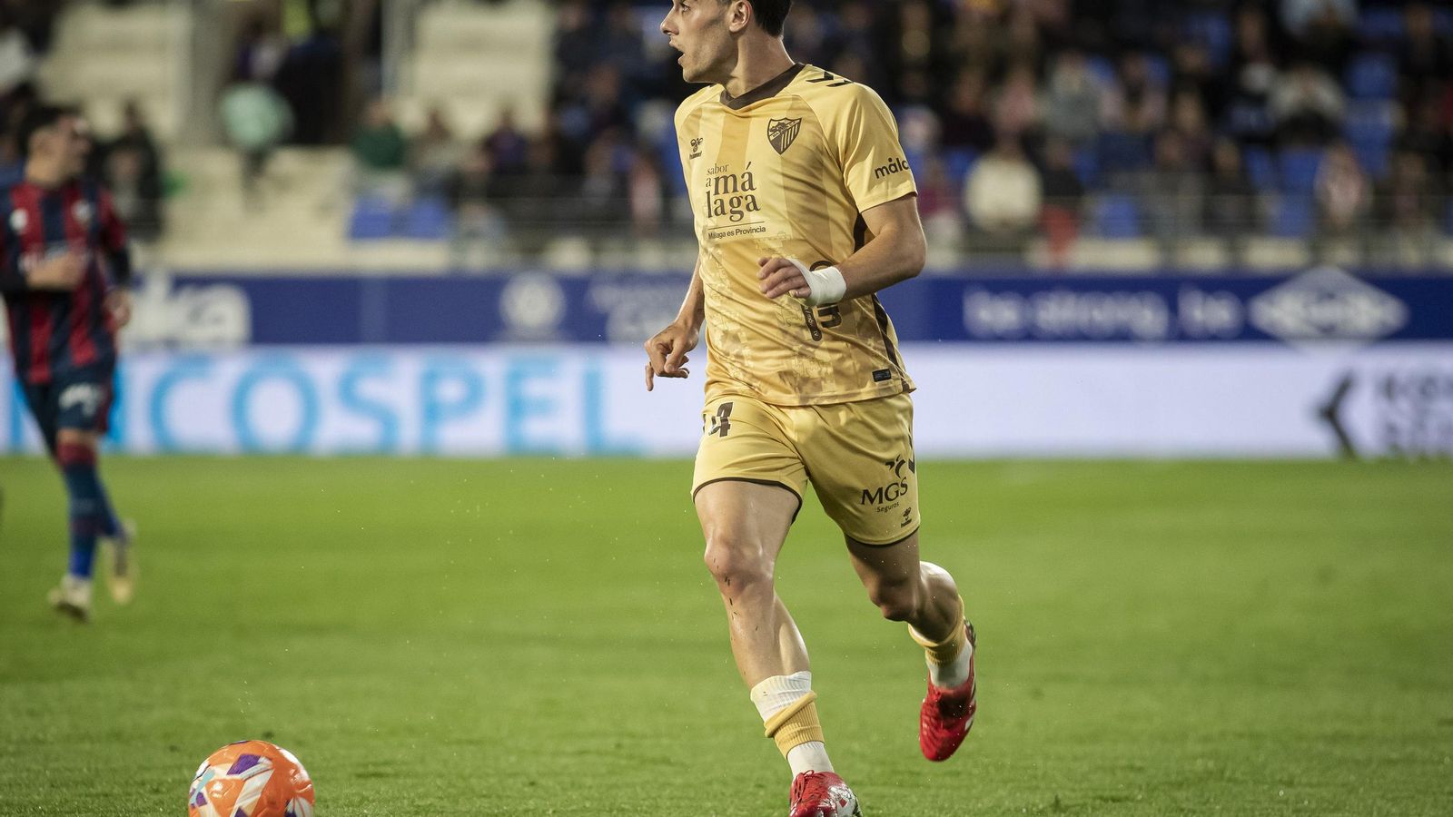 El Huesca-Málaga CF, en fotos