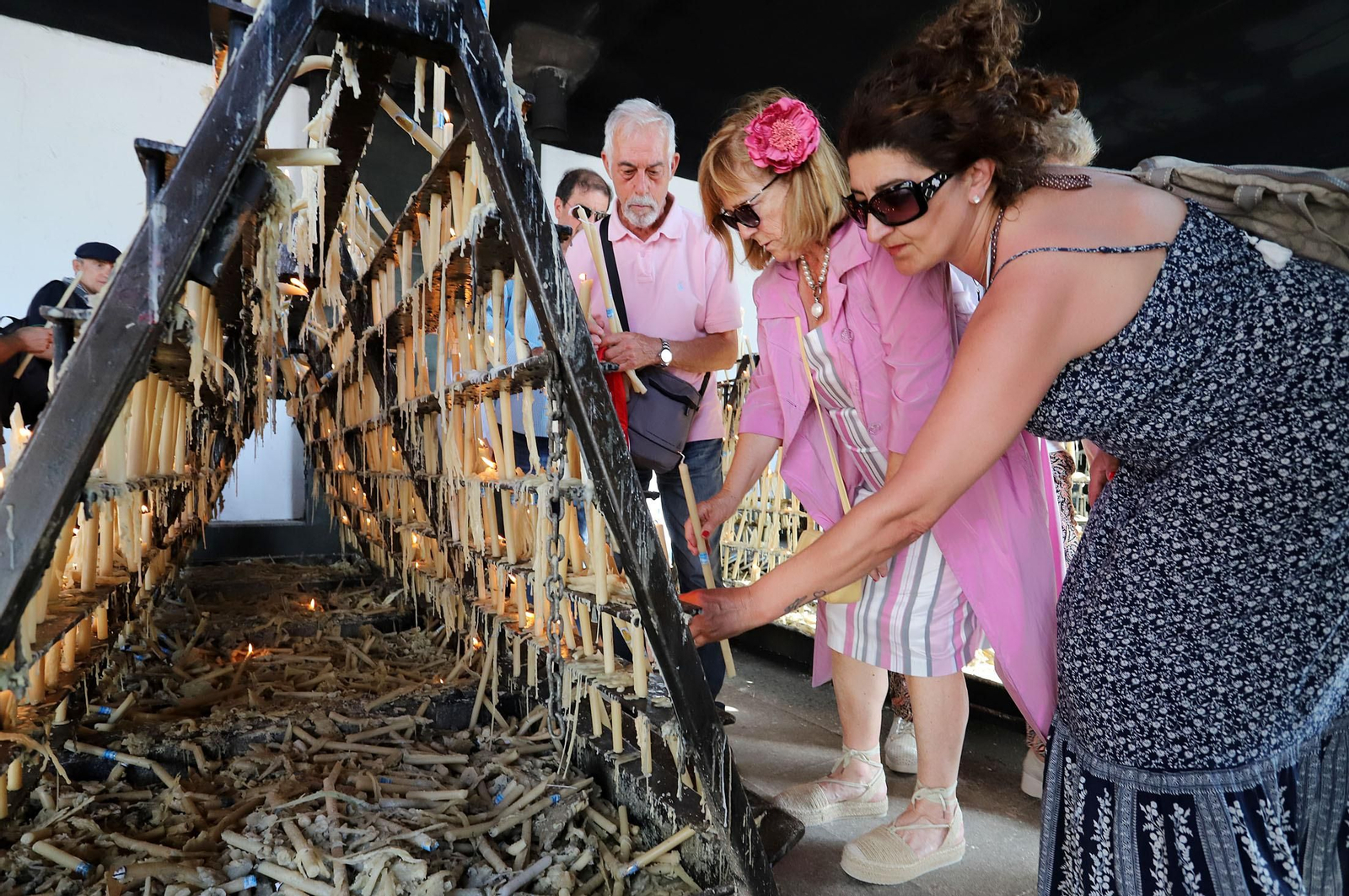 Ambiente en la aldea del Rocío previo a la llegada de las Hermandades, en imágenes