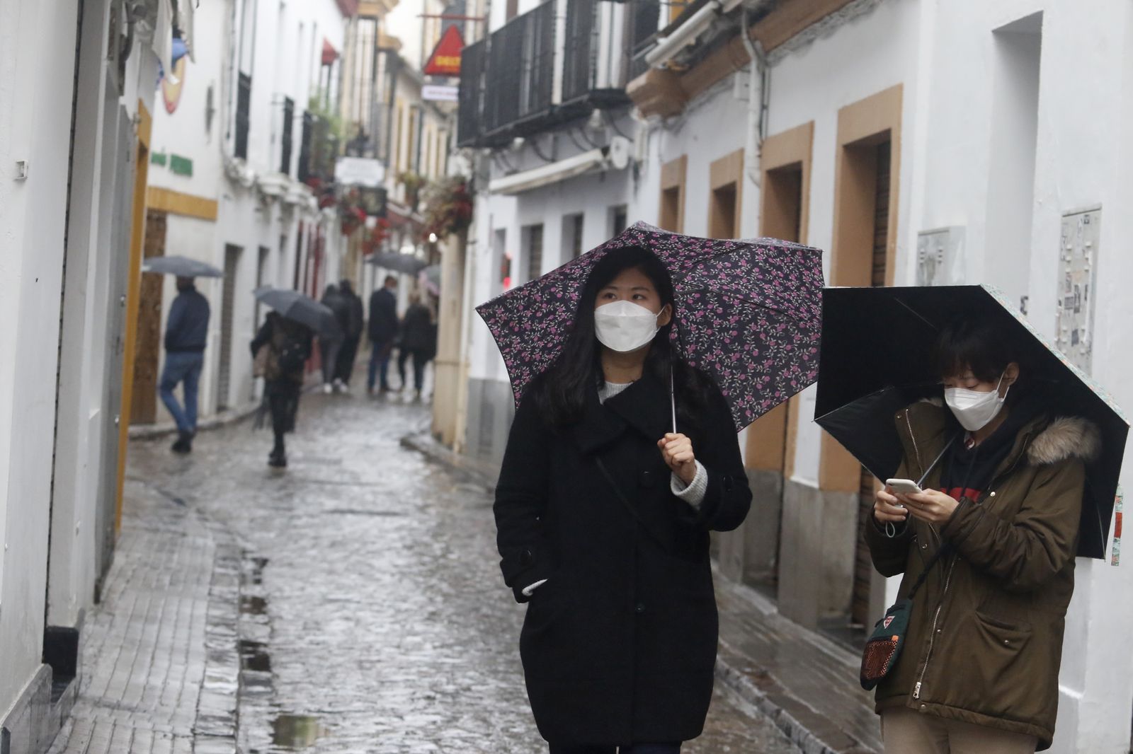 Un día de Navidad en Córdoba pasado por agua, en fotografías