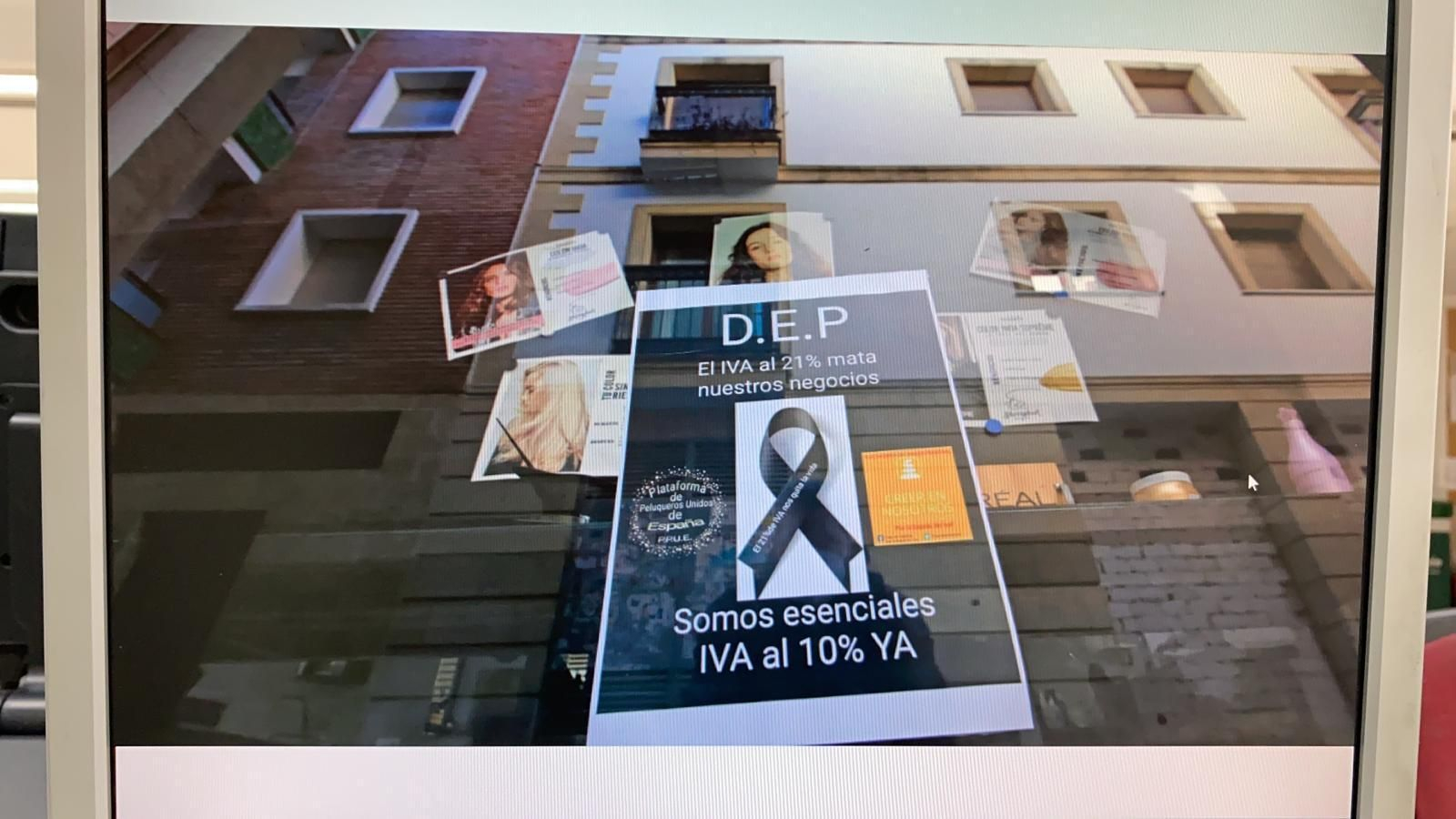 Cartel reivindicativo en una peluquería de Jerez.