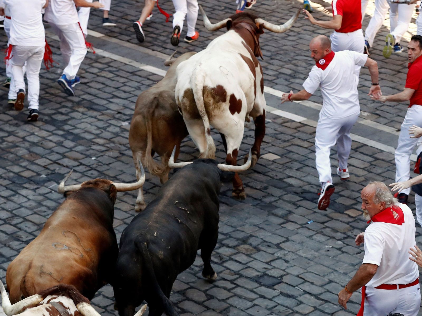 El quinto encierro de los Sanfermines, en imágenes