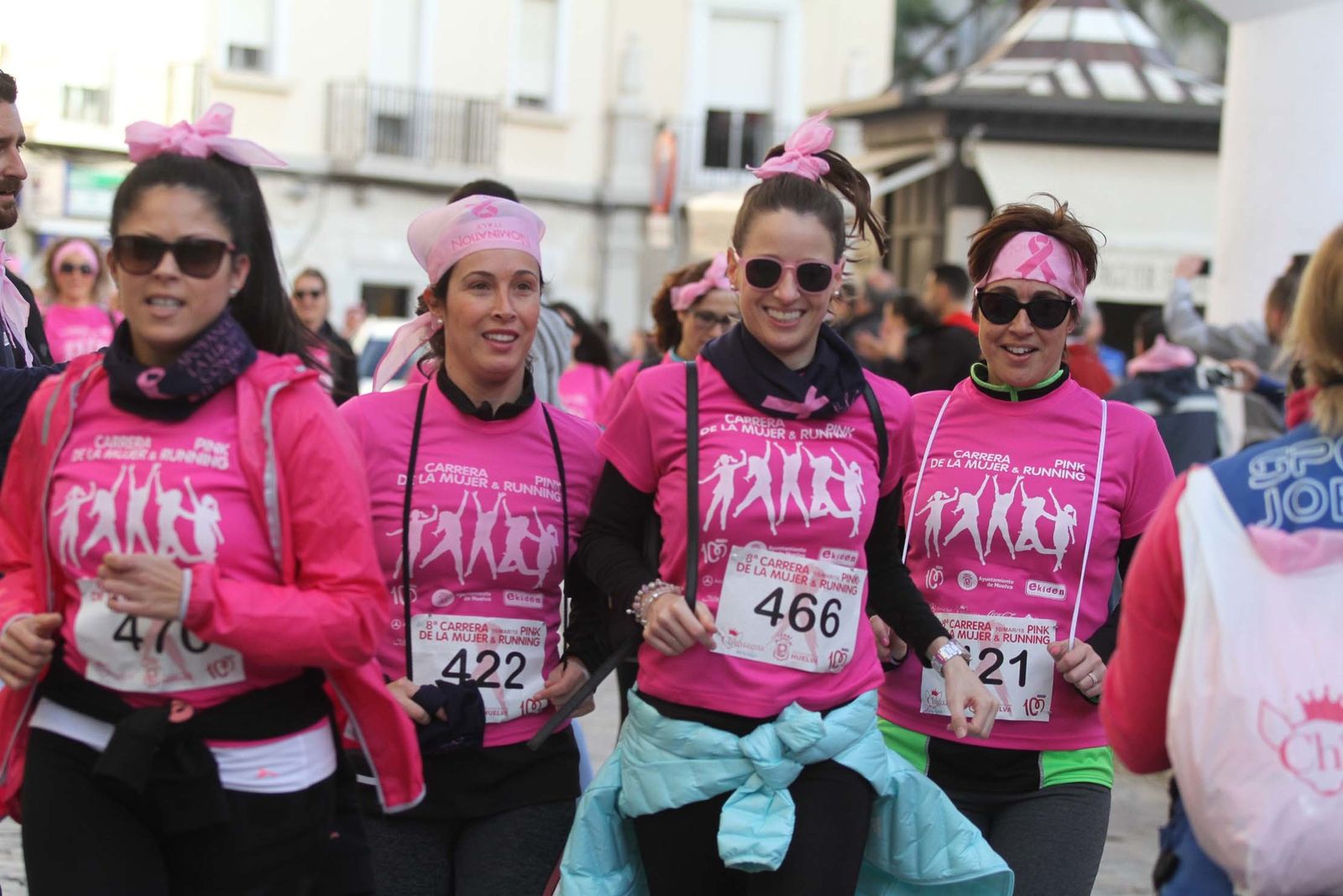 Imágenes de la Carrera contra el cáncer de mama de Huelva.