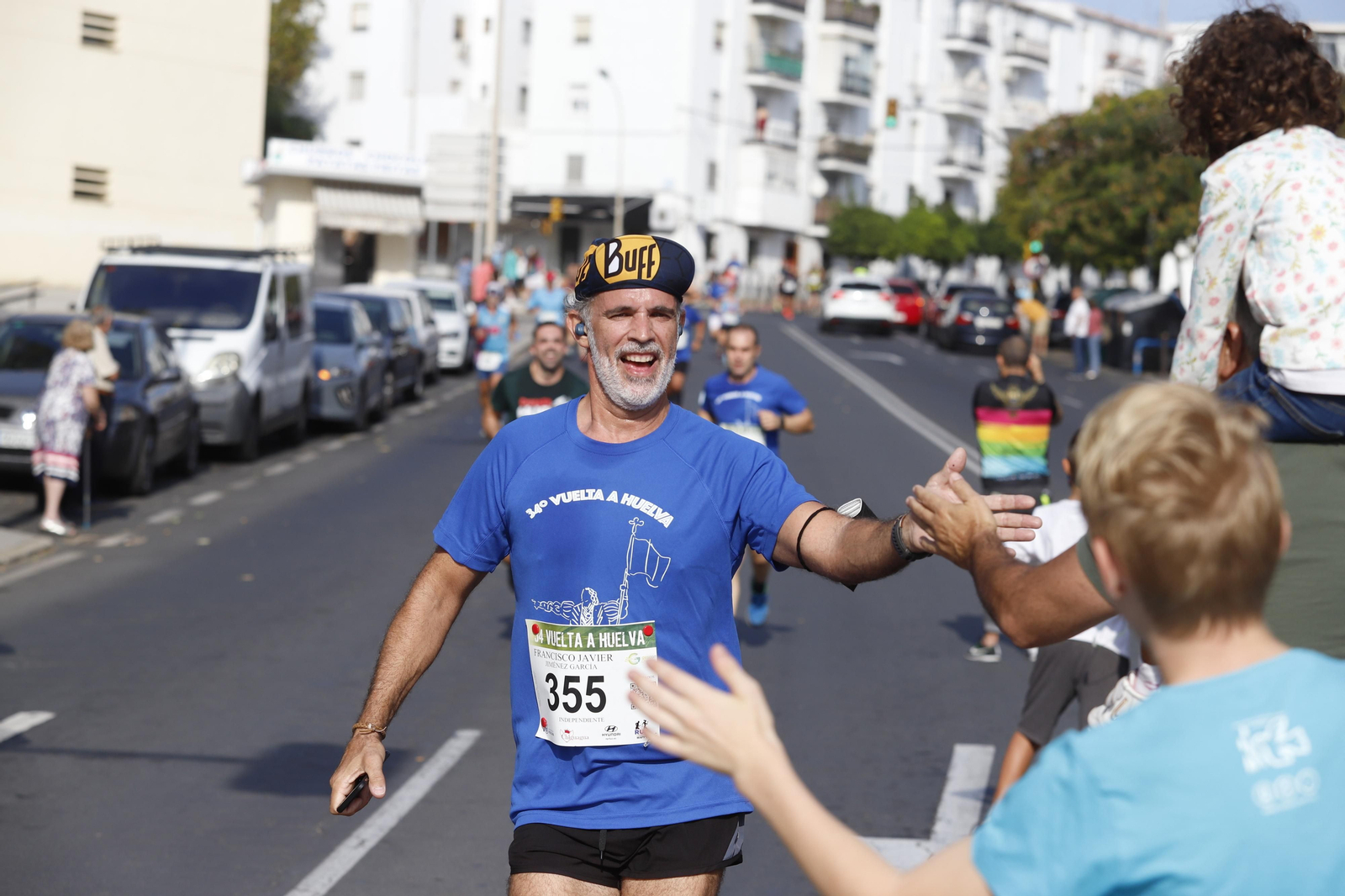 Las imágenes de la vuelta a Huelva de atletismo