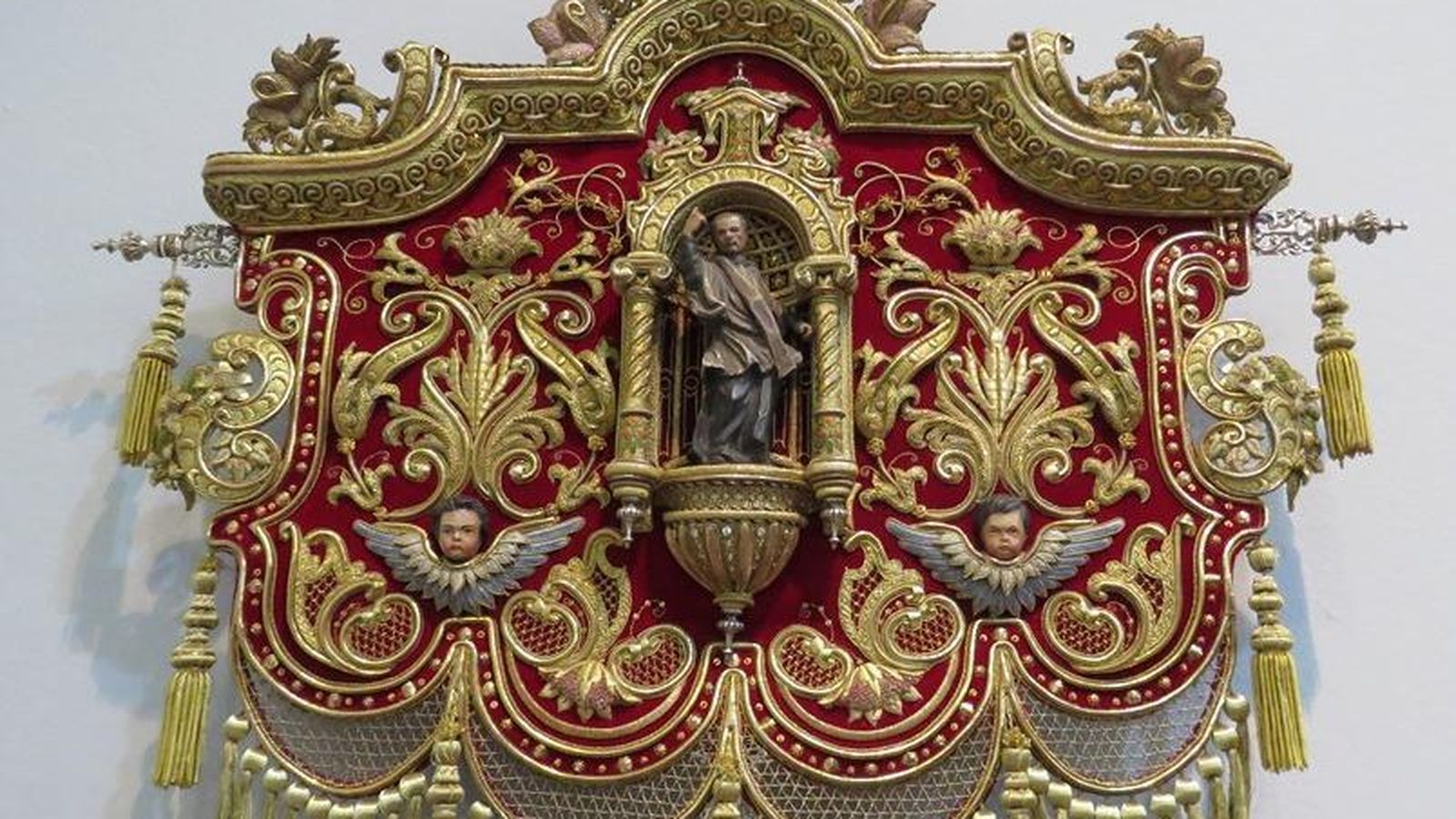 Guión de la caridad.