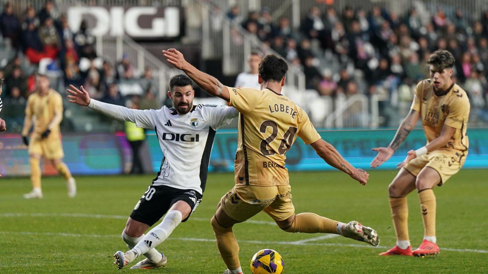 El Burgos-Málaga CF, en fotos